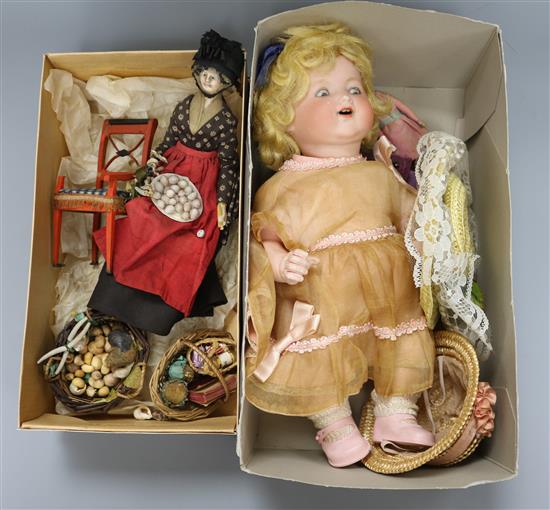 An Armand Marseille bisque headed doll, a peddler doll and sundry dolls house miniatures